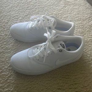 Like new white Nike SB Check Solarsoft Canvas size 7